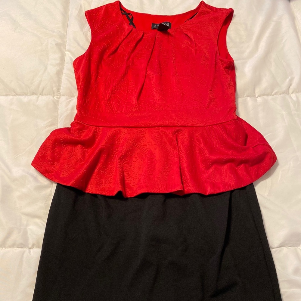 Red and black body con dress.